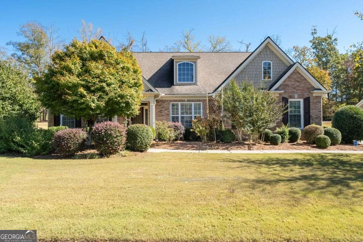 1518 Sage Ridge Drive Marietta, GA 30064 - Photo 1 of 1 a front view of house with yard and trees around