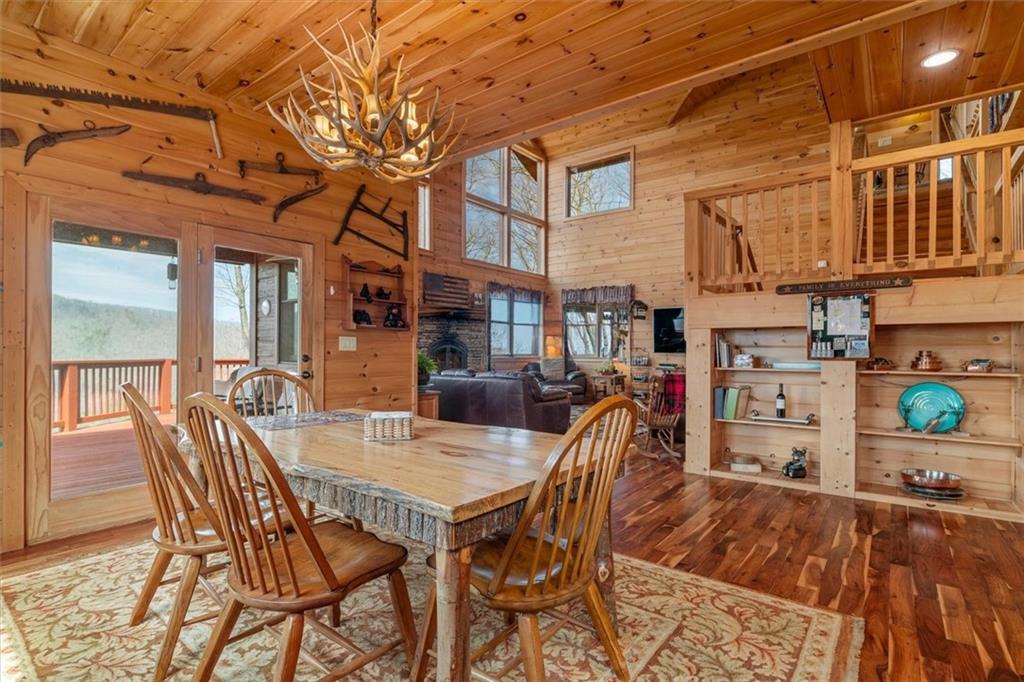 881 Fox Mountain Road Cherry Log, GA 30522 - Photo 27 of 65 a view of a patio with a table and chairs
