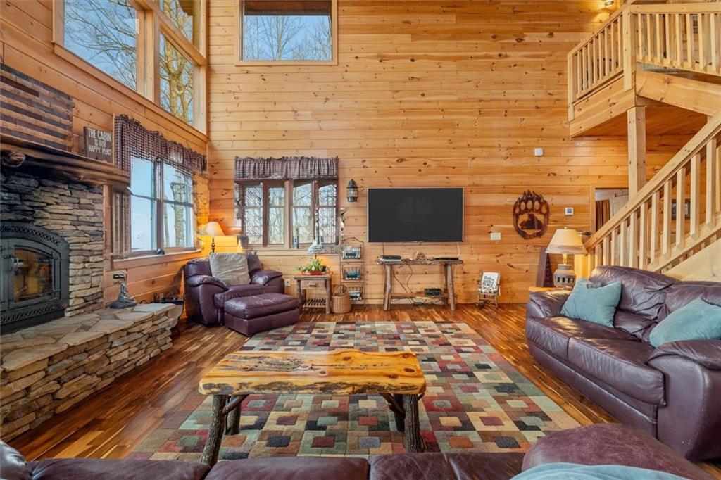 881 Fox Mountain Road Cherry Log, GA 30522 - Photo 29 of 65 a outdoor space with patio fireplace and a couch