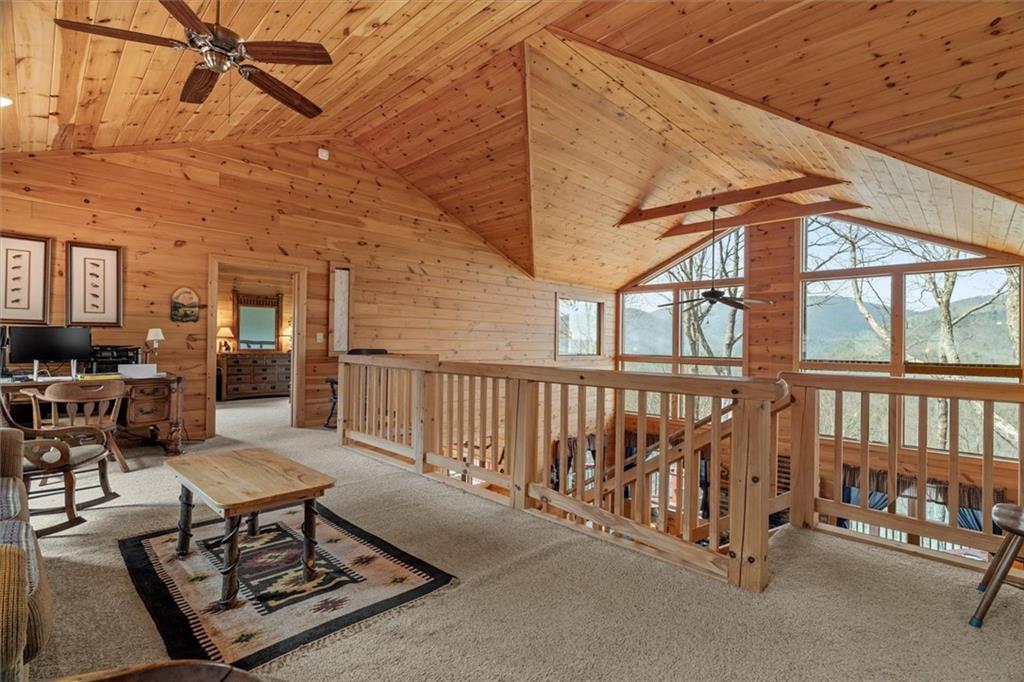 881 Fox Mountain Road Cherry Log, GA 30522 - Photo 42 of 65 a view of a chairs and table in the balcony