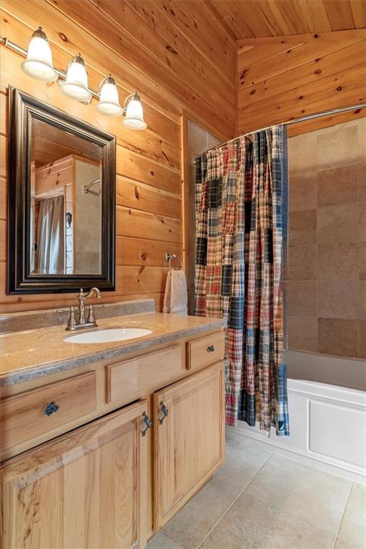 881 Fox Mountain Road Cherry Log, GA 30522 - Photo 47 of 65 a bathroom with a double vanity sink mirror and bathtub