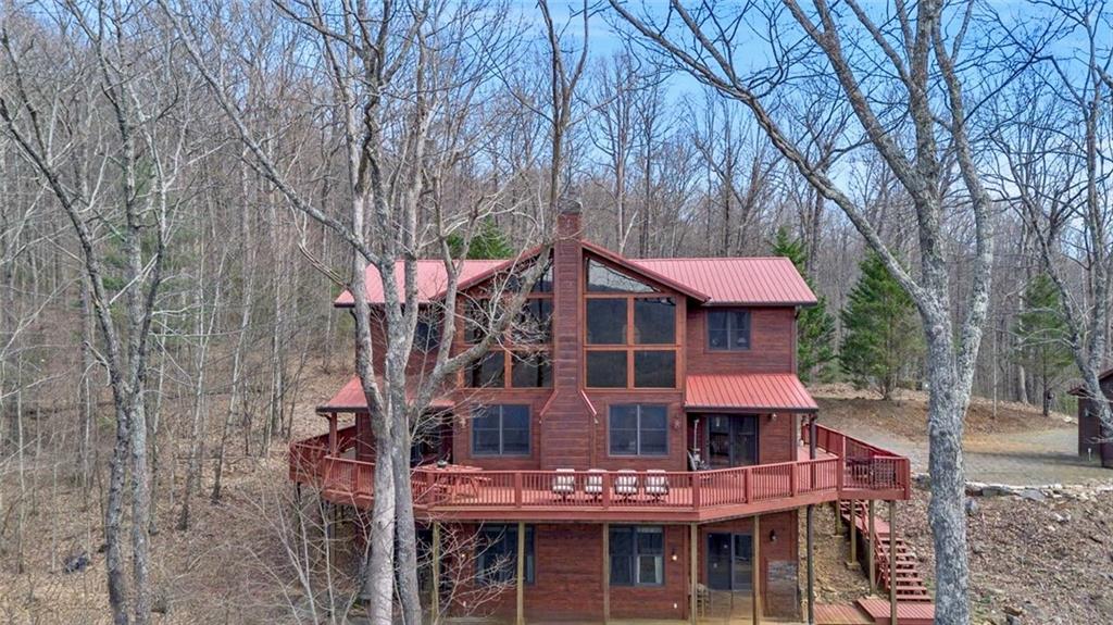 881 Fox Mountain Road Cherry Log, GA 30522 - Photo 62 of 65 a front view of a building with trees