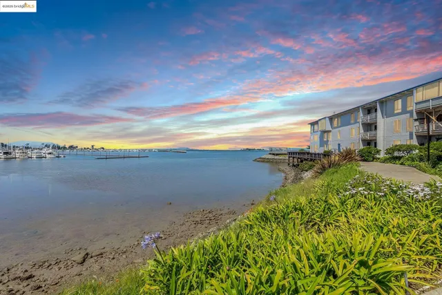 a view of a lake with a yard