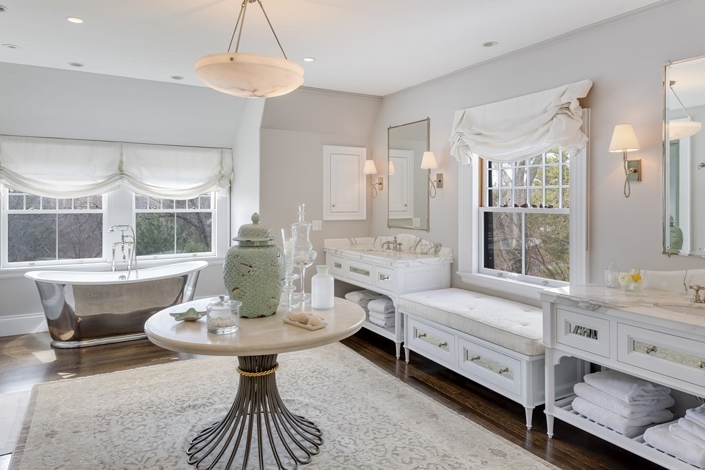 235 Nashawtuc Road Concord, MA 01742 - Photo 14 of 26 a living room with furniture and a table