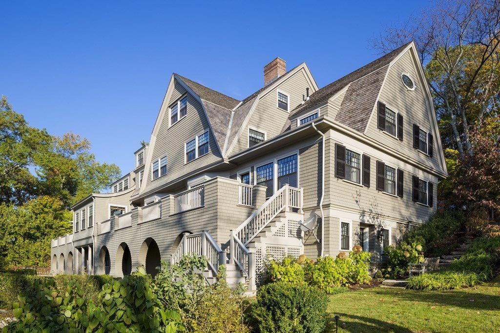 235 Nashawtuc Road Concord, MA 01742 - Photo 2 of 26 a view of a white building among the street and fountain