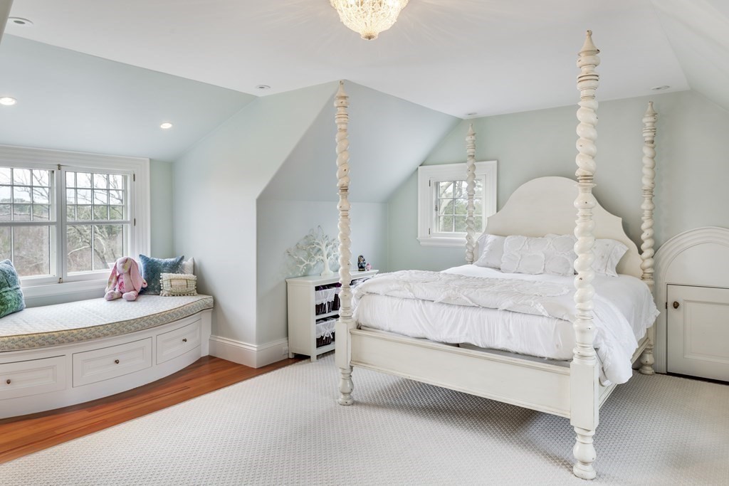 235 Nashawtuc Road Concord, MA 01742 - Photo 21 of 26 a bedroom with a bed and a dresser
