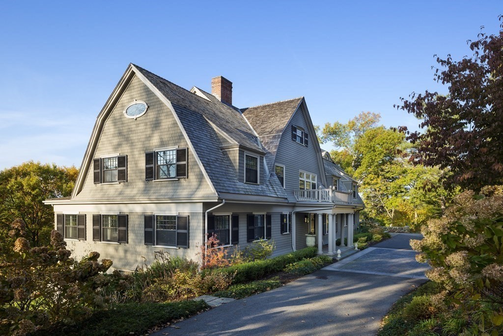 235 Nashawtuc Road Concord, MA 01742 - Photo 22 of 26 a front view of a house with garden