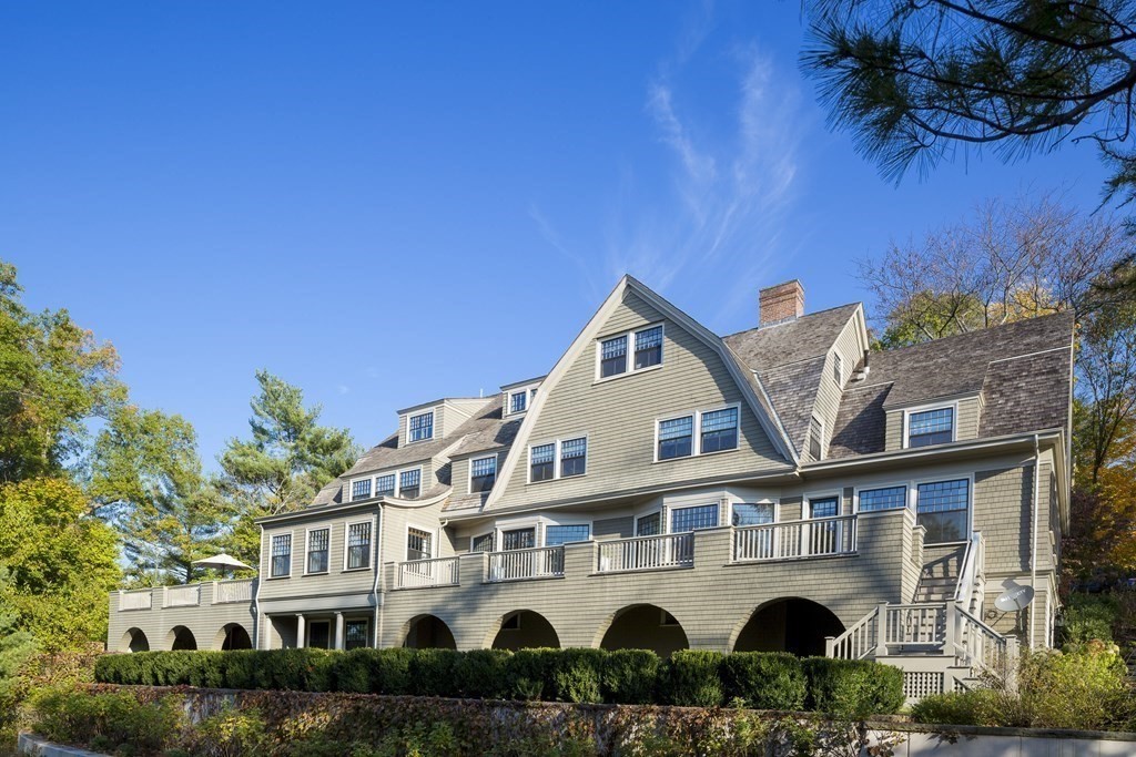 235 Nashawtuc Road Concord, MA 01742 - Photo 24 of 26 a front view of a house with garden