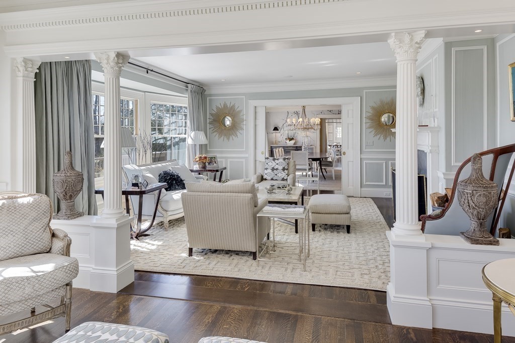 235 Nashawtuc Road Concord, MA 01742 - Photo 5 of 26 a living room with fireplace furniture and a large window