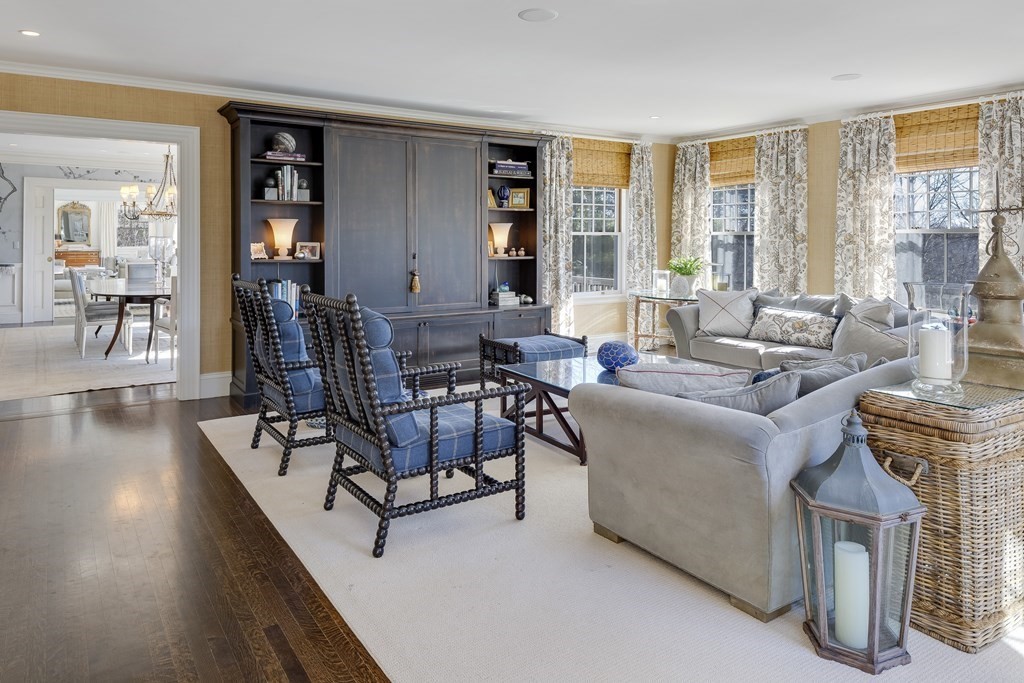 235 Nashawtuc Road Concord, MA 01742 - Photo 9 of 26 a living room with furniture and large windows