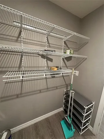 a view of a room with rack on the wall