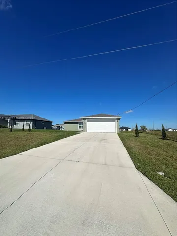 a view of street with grass