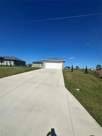 a view of a field with an empty space