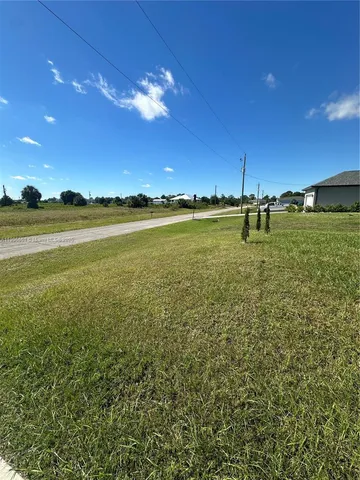 a view of an lake and a yard