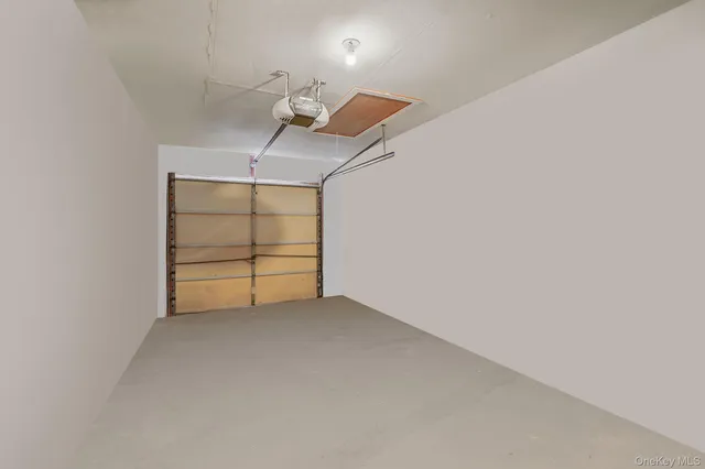 a view of room that has a ceiling fan