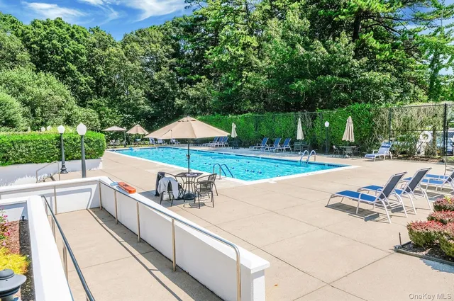 a view of a terrace with sitting area
