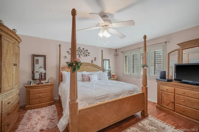 a bed room with a bed and furniture