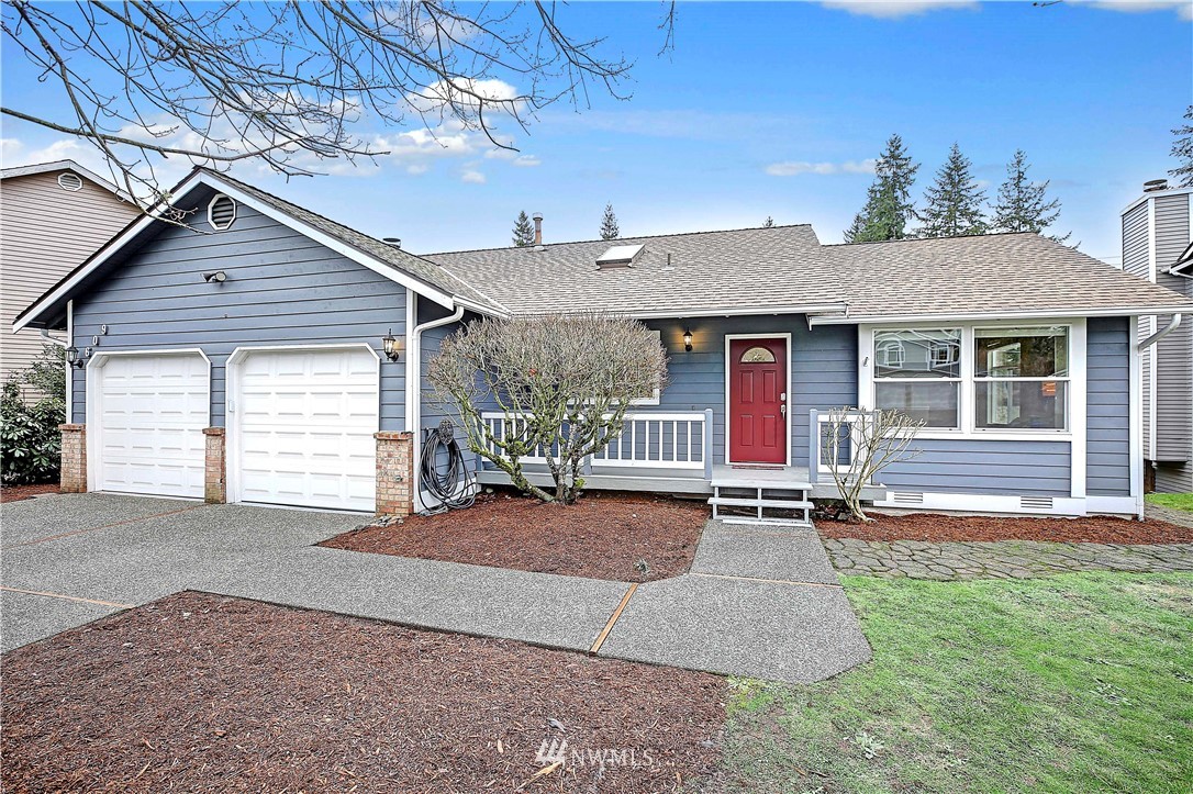 609 213th Street Southwest Bothell, WA 98021 - Photo 1 of 31 a view of a house with a patio and a yard