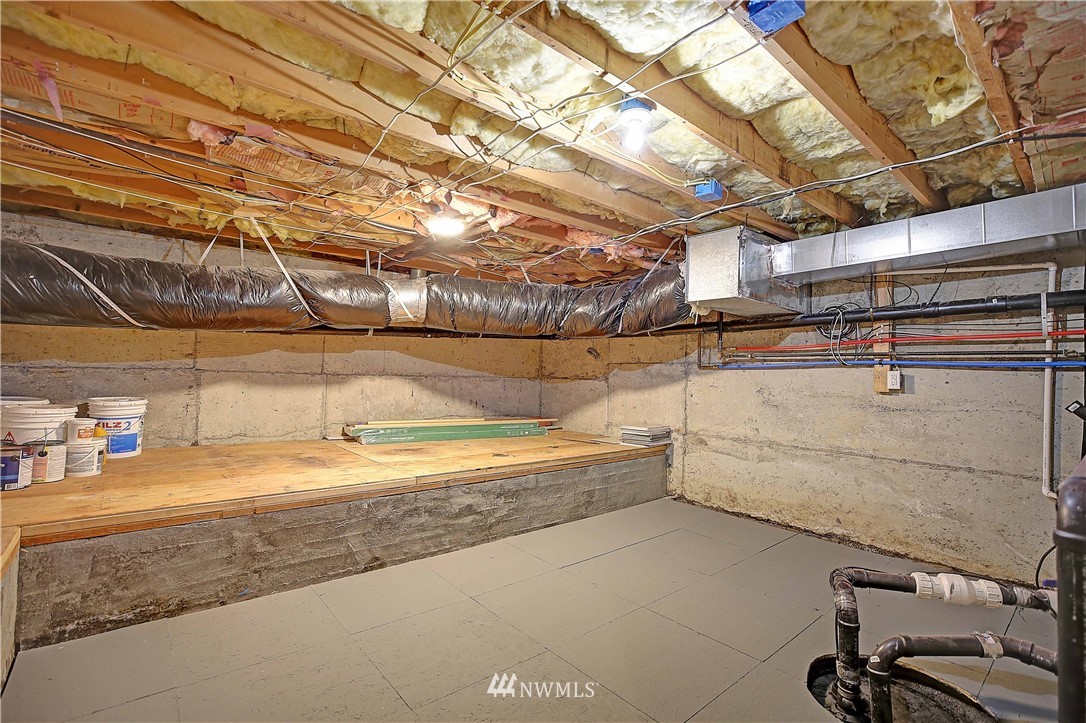 609 213th Street Southwest Bothell, WA 98021 - Photo 24 of 31 a view of a room with racks on the wall