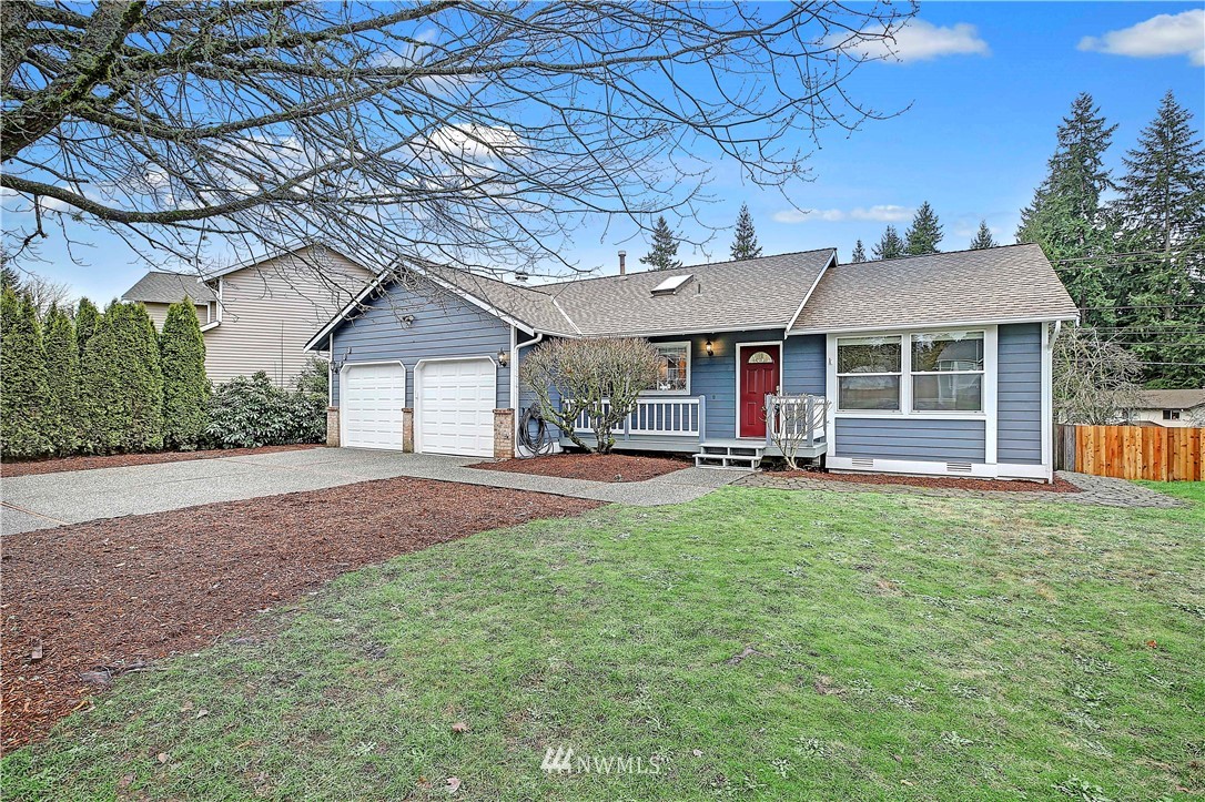 609 213th Street Southwest Bothell, WA 98021 - Photo 30 of 31 a house view with a garden space