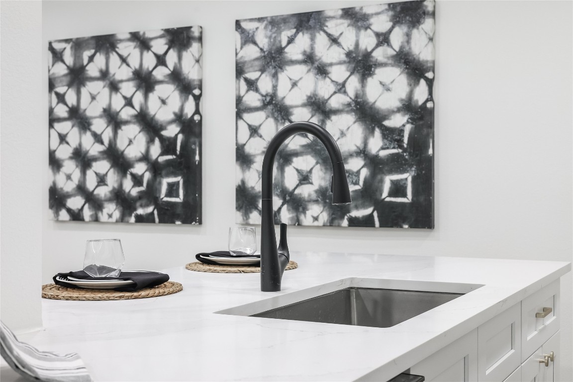 12208 Double Tree Lane Austin, TX 78750 - Photo 22 of 35 a bathroom with a sink and a mirror