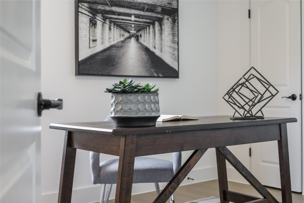 12208 Double Tree Lane Austin, TX 78750 - Photo 25 of 35 a table with a vase and flowers on it