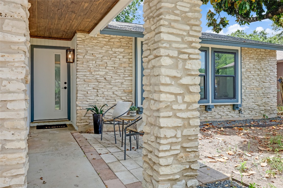 12208 Double Tree Lane Austin, TX 78750 - Photo 3 of 35 a front view of a house with outdoor seating