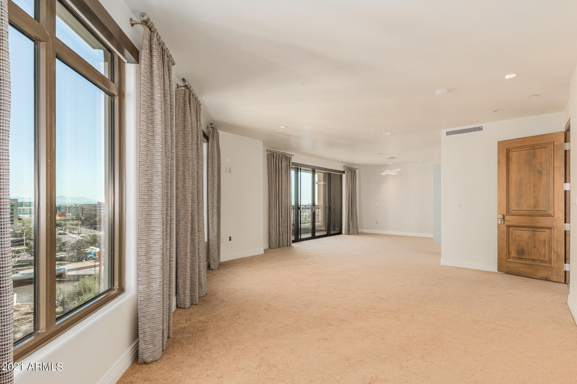 7175 East Camelback Road, Unit 707 Scottsdale, AZ 85251 - Photo 11 of 31 a view of an empty room with a window