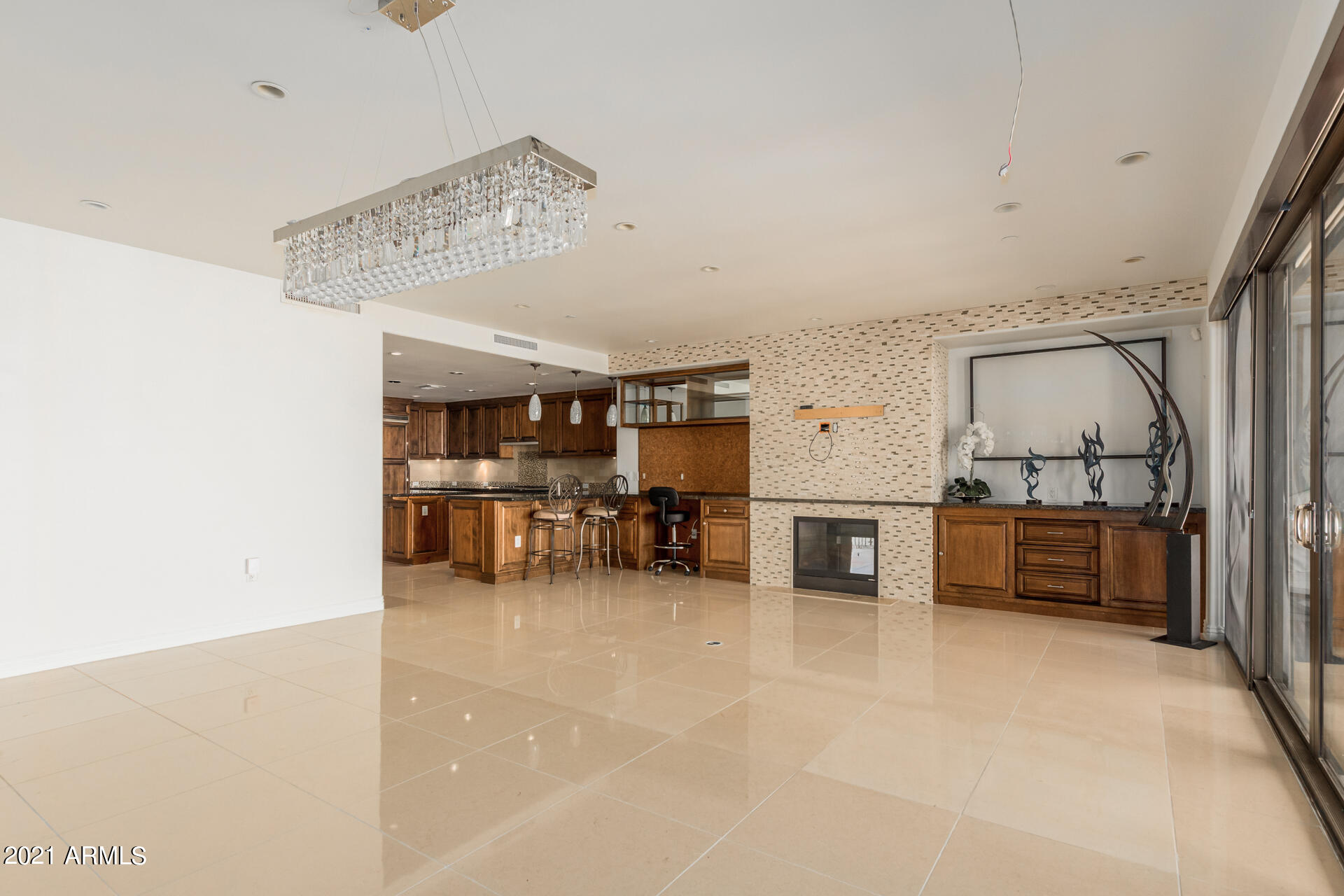 7175 East Camelback Road, Unit 707 Scottsdale, AZ 85251 - Photo 10 of 31 a view of a livingroom with furniture and a flat screen tv