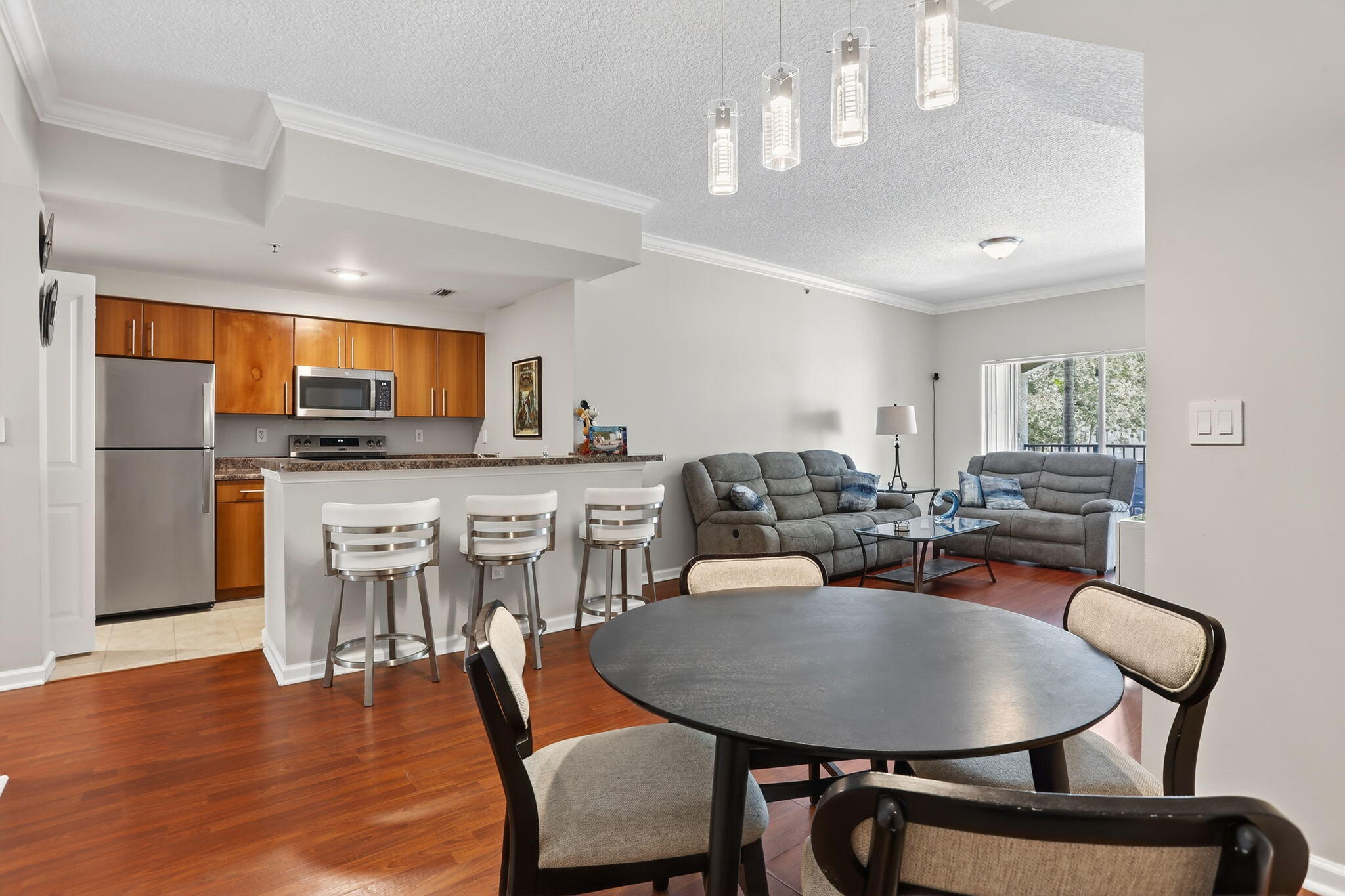a view of a dining room with furniture