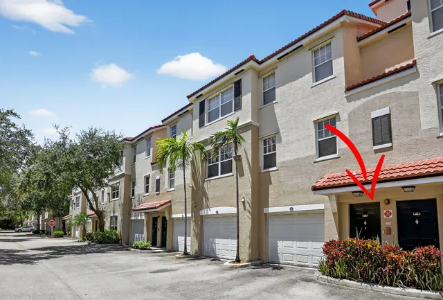 a picture of a room with a white wall and a picture