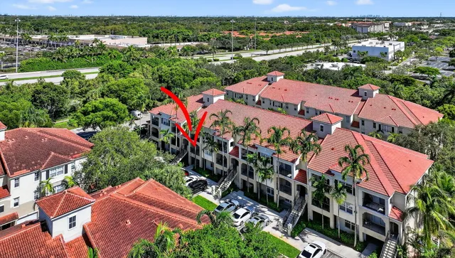 a view of a building with a yard