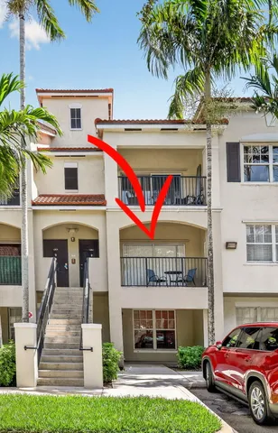 an aerial view of residential houses with outdoor space and street view