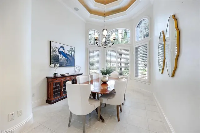 a kitchen with a stove sink and cabinets
