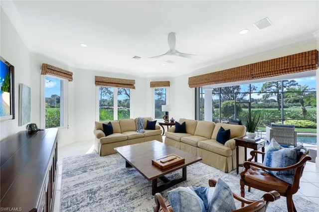 a view of a backyard with swimming pool