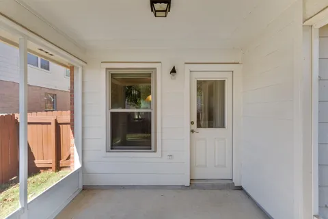 wooden floor and window in a room