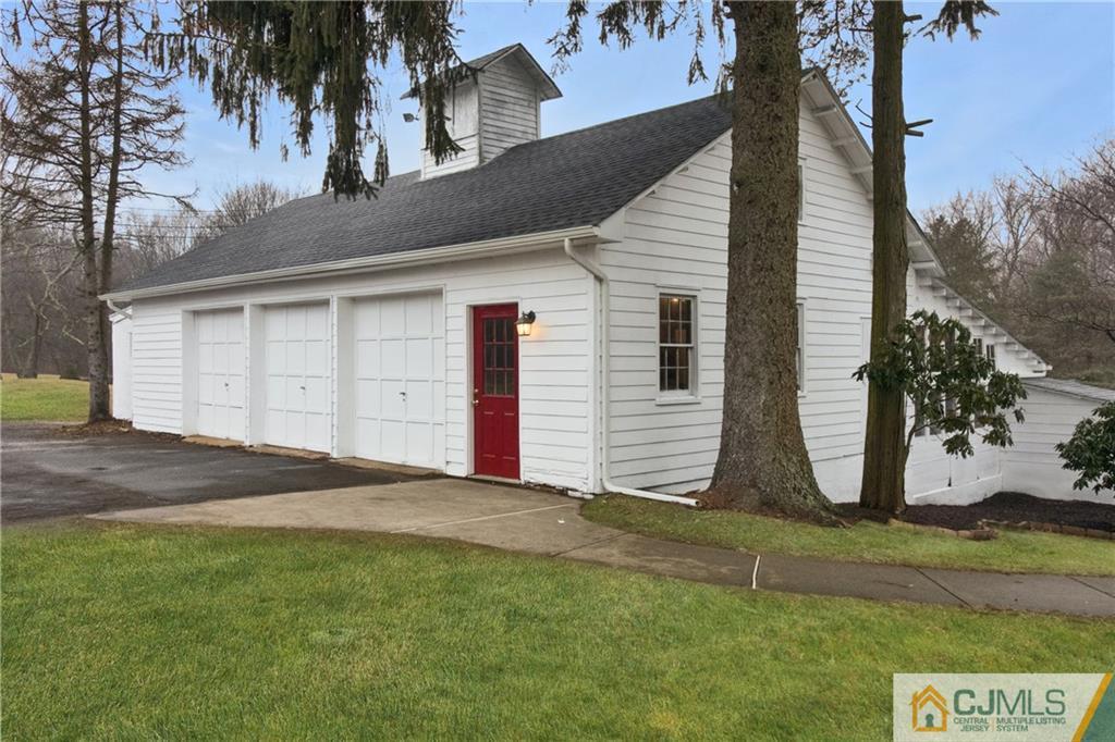 19 Reids Hill Road Morganville, NJ 07751 - Photo 19 of 24 a view of a backyard of the house