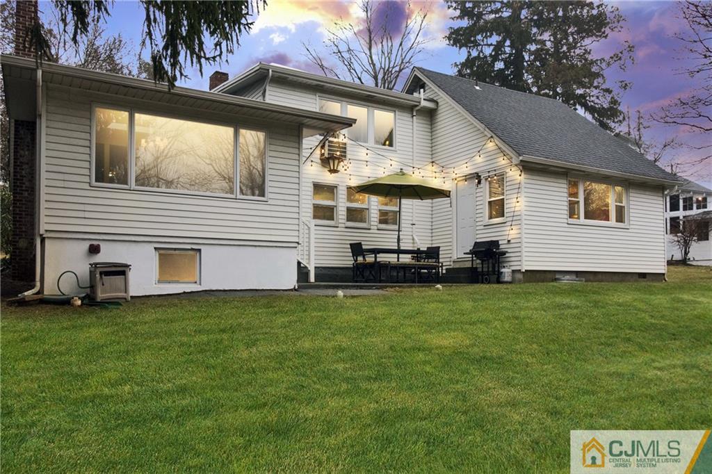 19 Reids Hill Road Morganville, NJ 07751 - Photo 23 of 24 a view of a house with a backyard