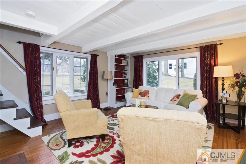 19 Reids Hill Road Morganville, NJ 07751 - Photo 4 of 24 a living room with furniture and a window