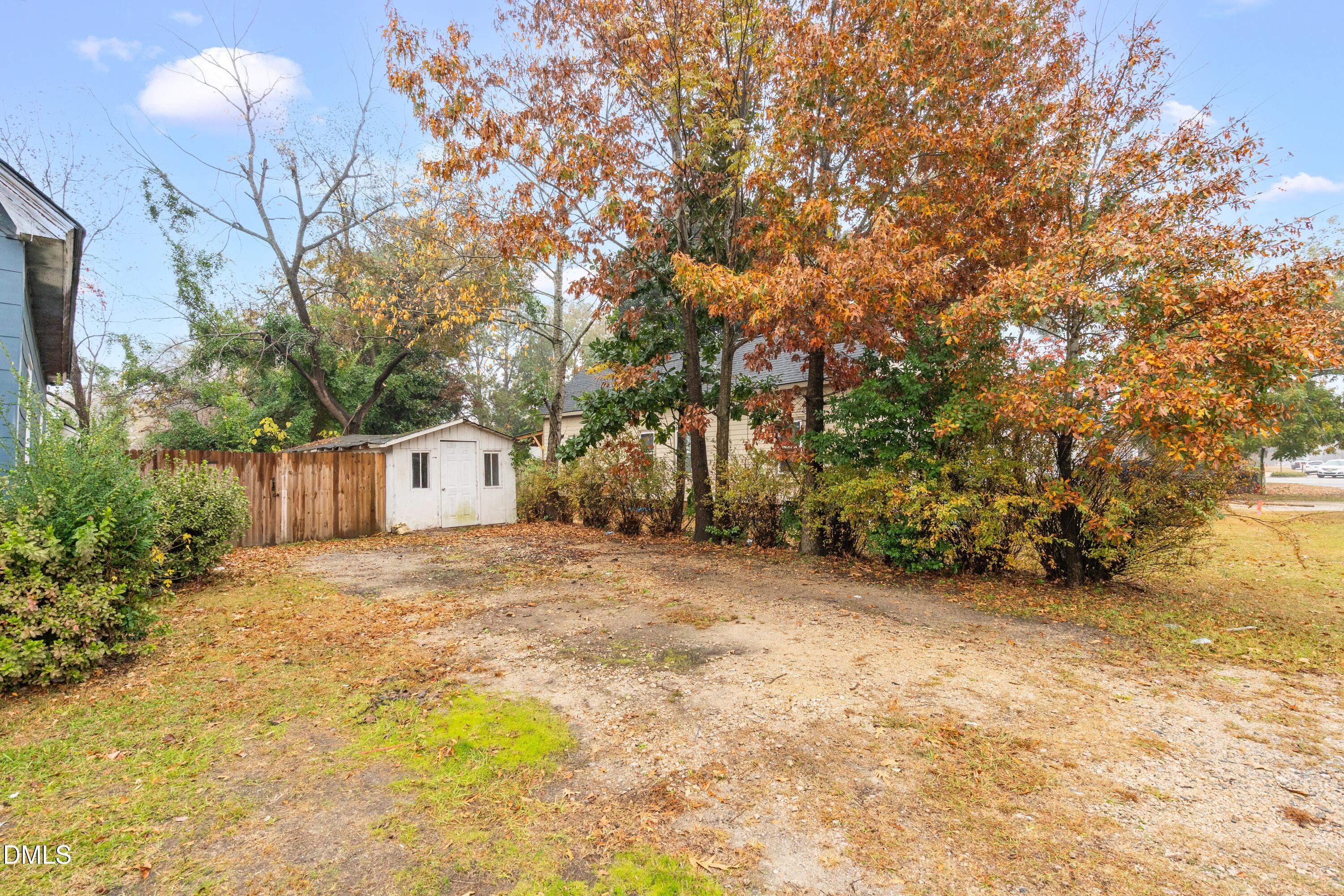 201 East H Street Erwin, NC 28339 - Photo 21 of 23 a bathroom with a sink and a yard