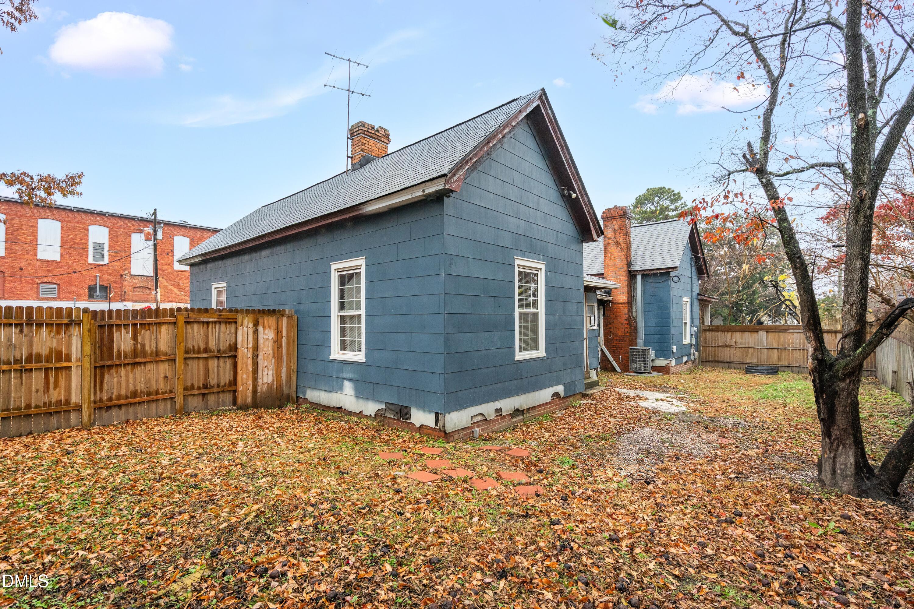 201 East H Street Erwin, NC 28339 - Photo 23 of 23 a front view of a house with a yard