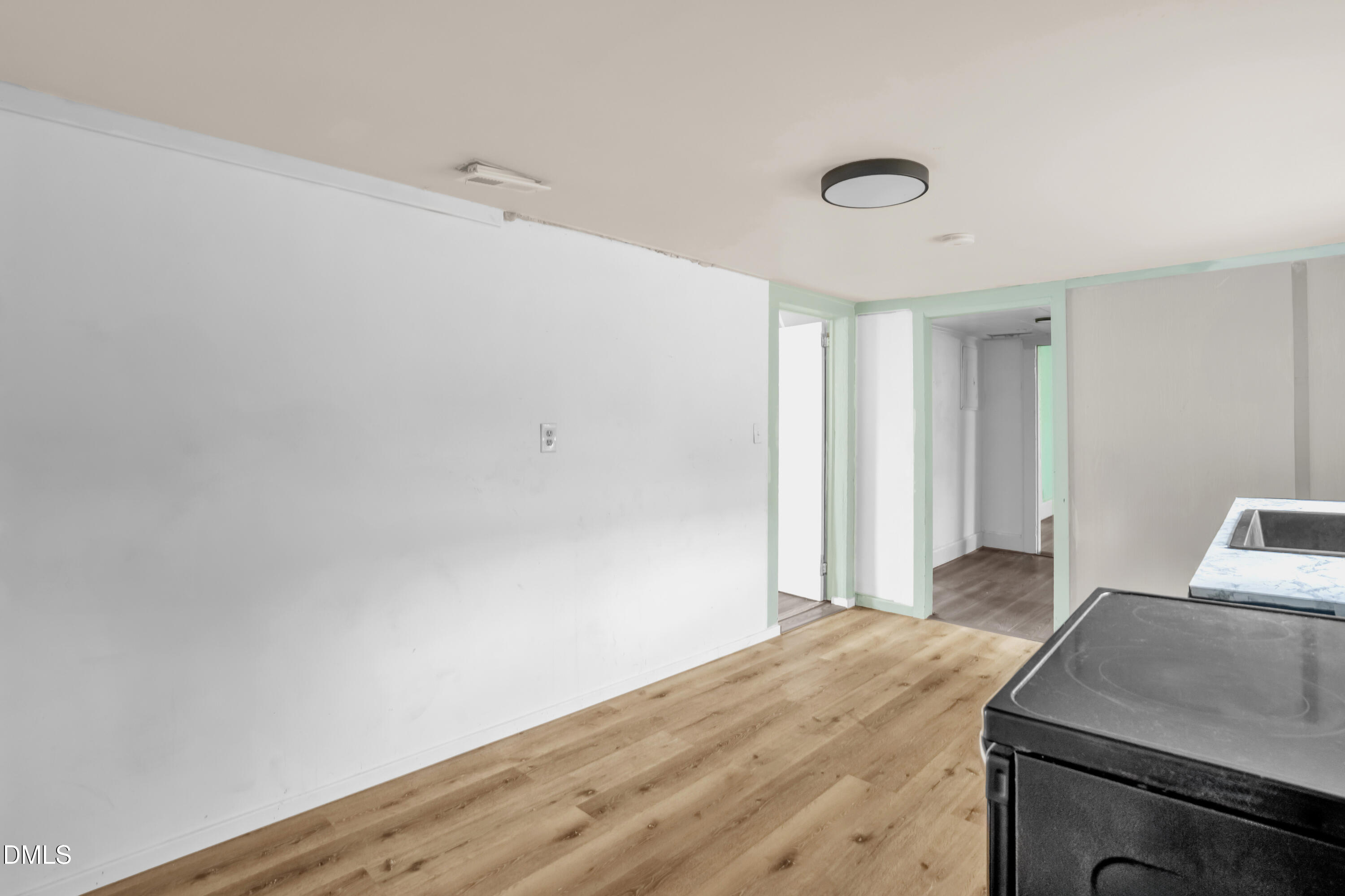 201 East H Street Erwin, NC 28339 - Photo 6 of 23 a view of a kitchen with a sink and dishwasher