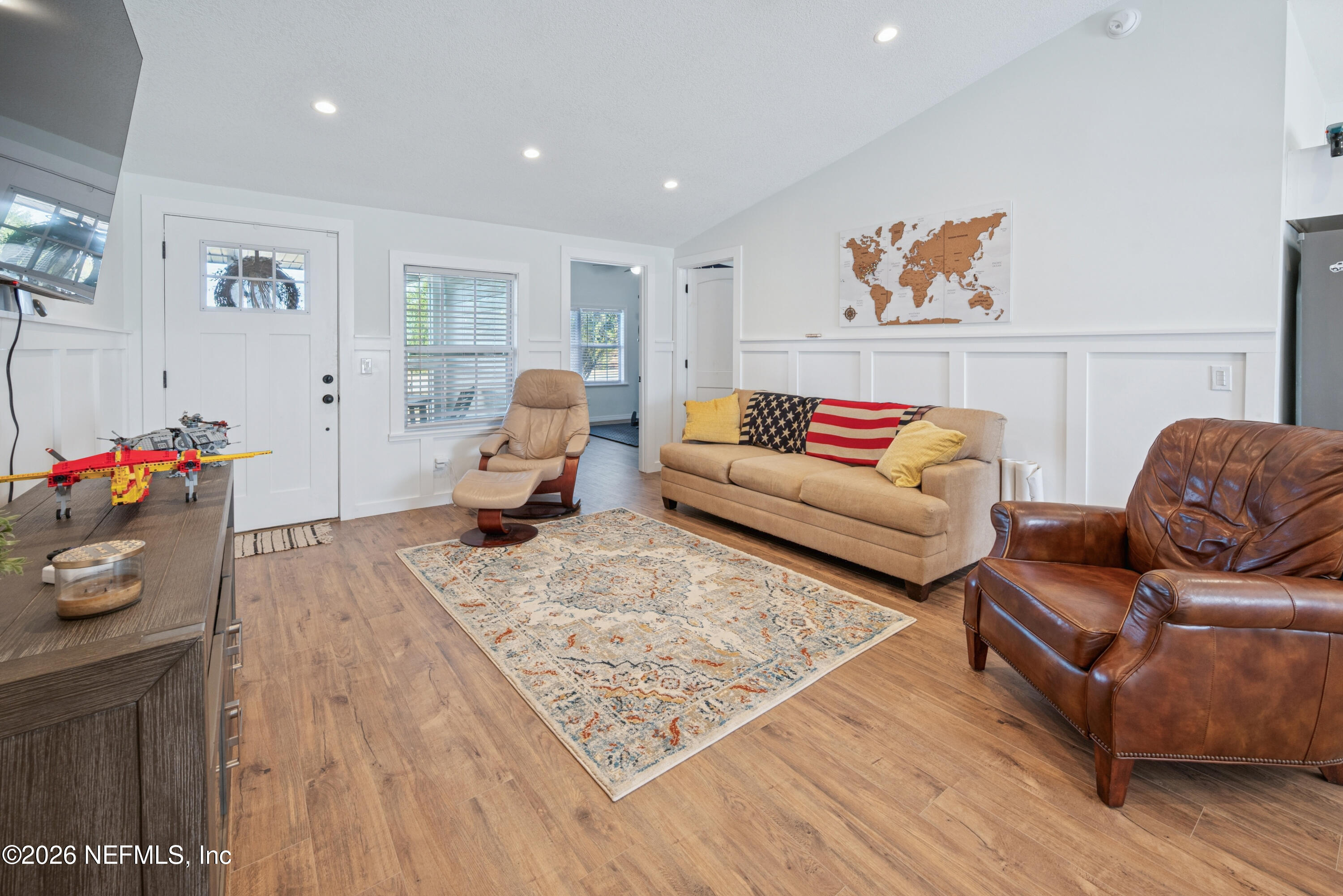 23779 Northwest 225a Road, Unit COUNTY Starke, FL 32091 - Photo 12 of 73 a living room with furniture and wooden floor