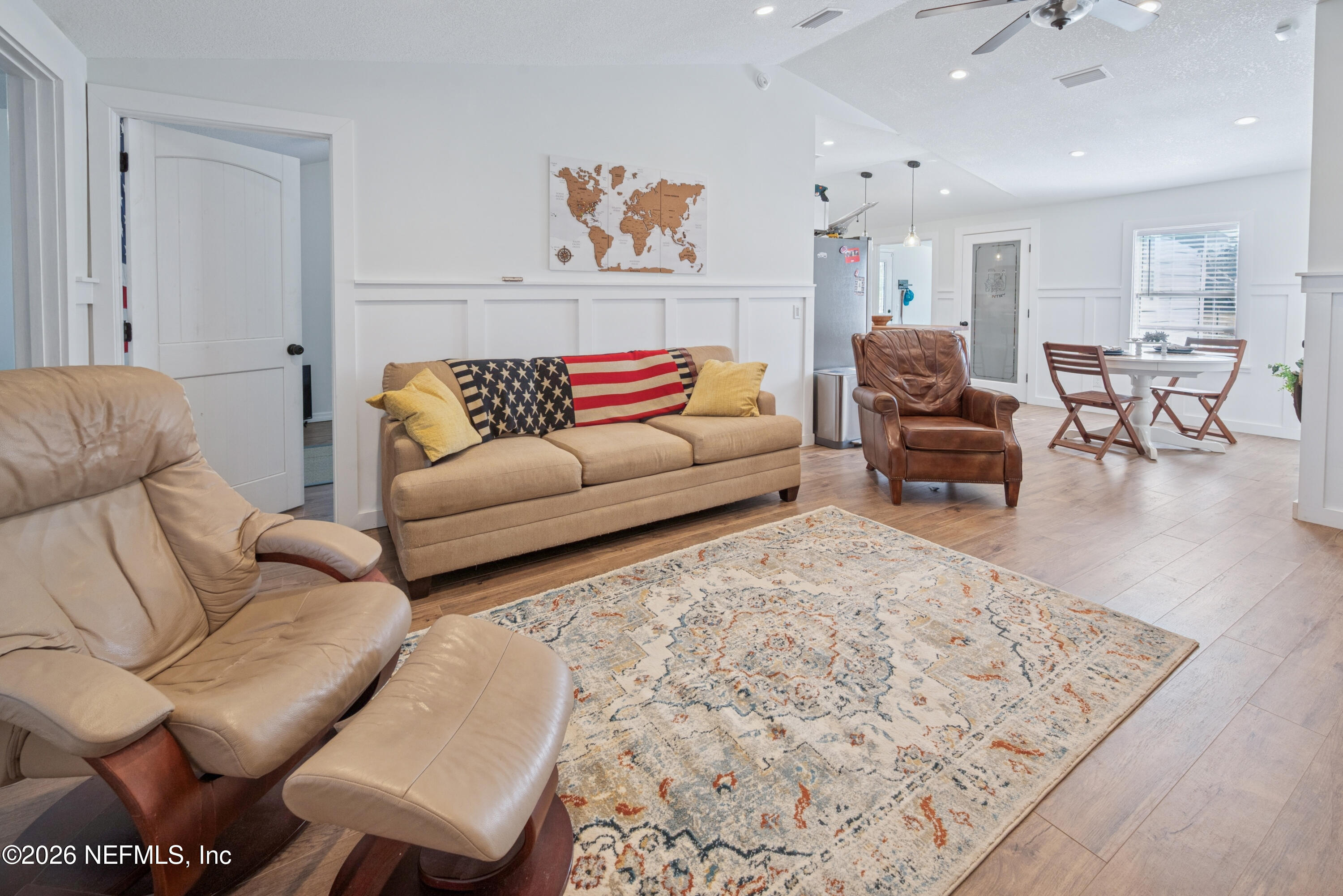 23779 Northwest 225a Road, Unit COUNTY Starke, FL 32091 - Photo 14 of 73 a living room with furniture and a couch