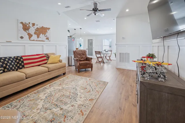 a kitchen with a table and chairs in it