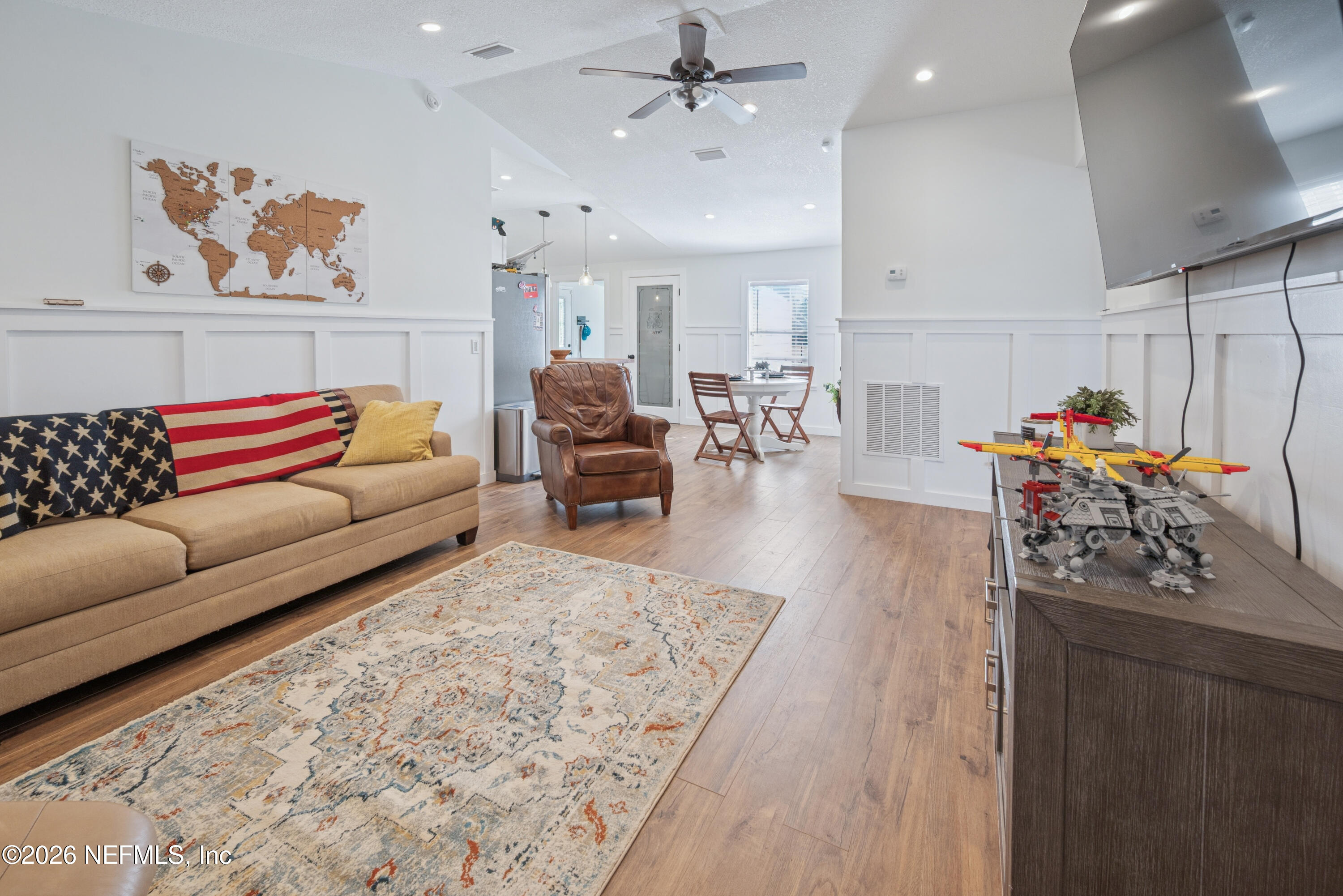 23779 Northwest 225a Road, Unit COUNTY Starke, FL 32091 - Photo 15 of 73 a living room with furniture and a couch