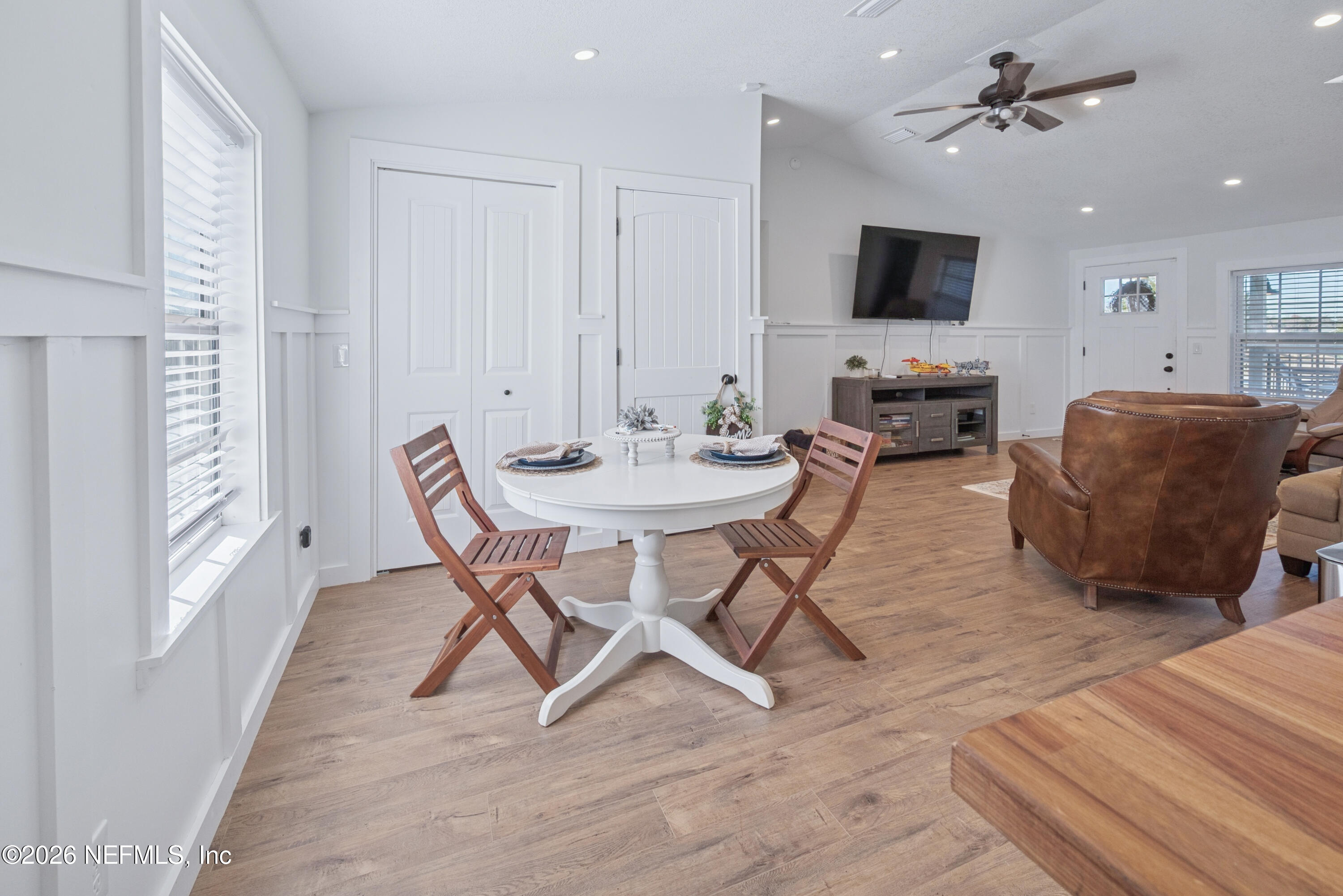 23779 Northwest 225a Road, Unit COUNTY Starke, FL 32091 - Photo 18 of 73 a view of a livingroom with furniture and a flat screen tv
