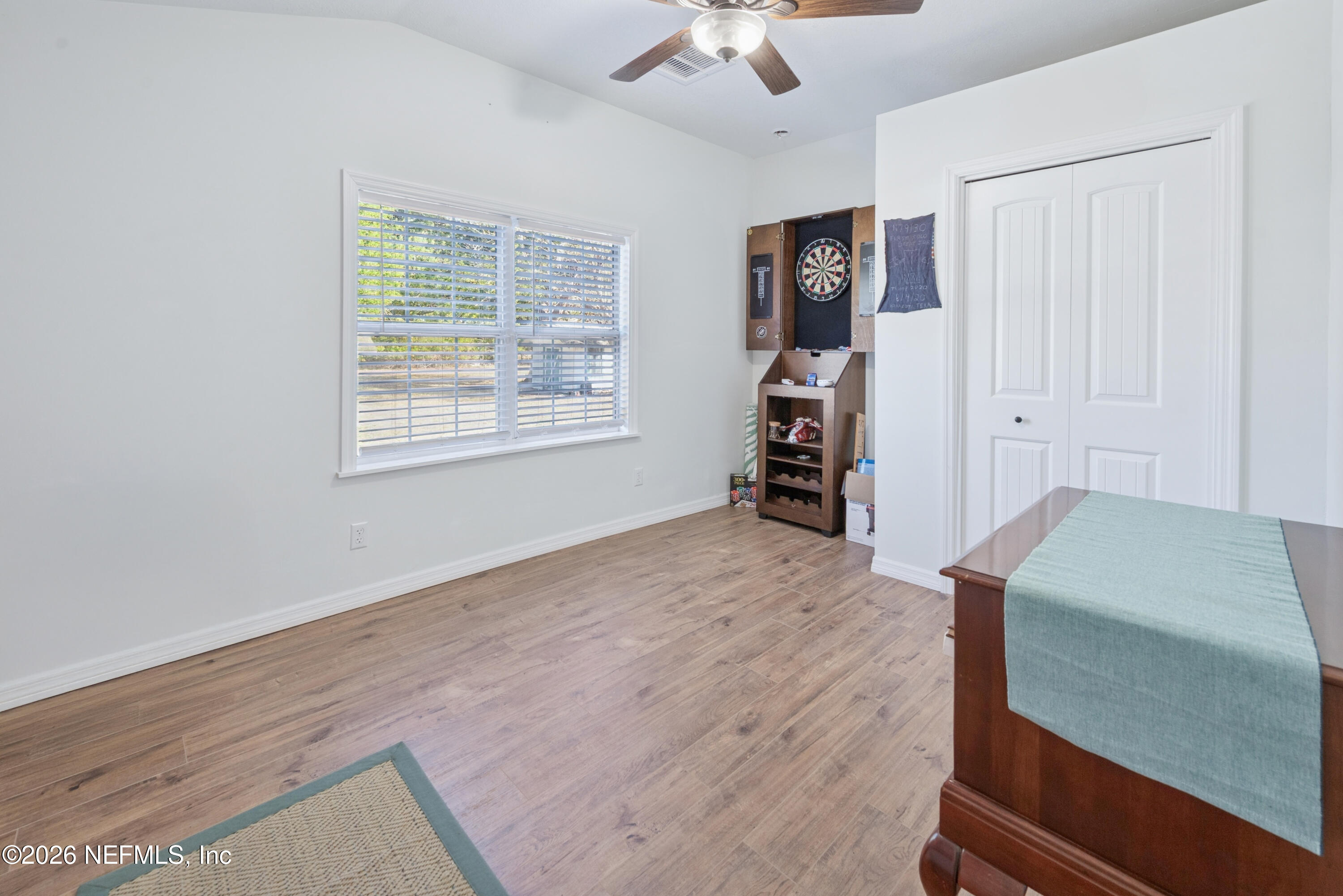23779 Northwest 225a Road, Unit COUNTY Starke, FL 32091 - Photo 27 of 73 a view of an empty room with a window