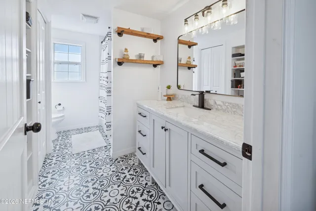 a view of a house with a big yard