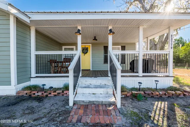 a view of a lake with lots of trees